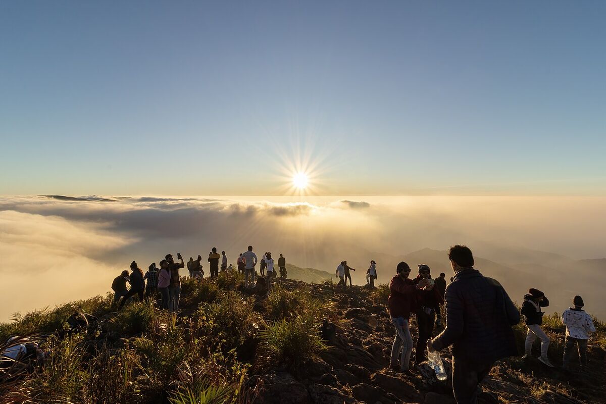 Sunrise above a sea of clouds at Vanjangi hilltop
